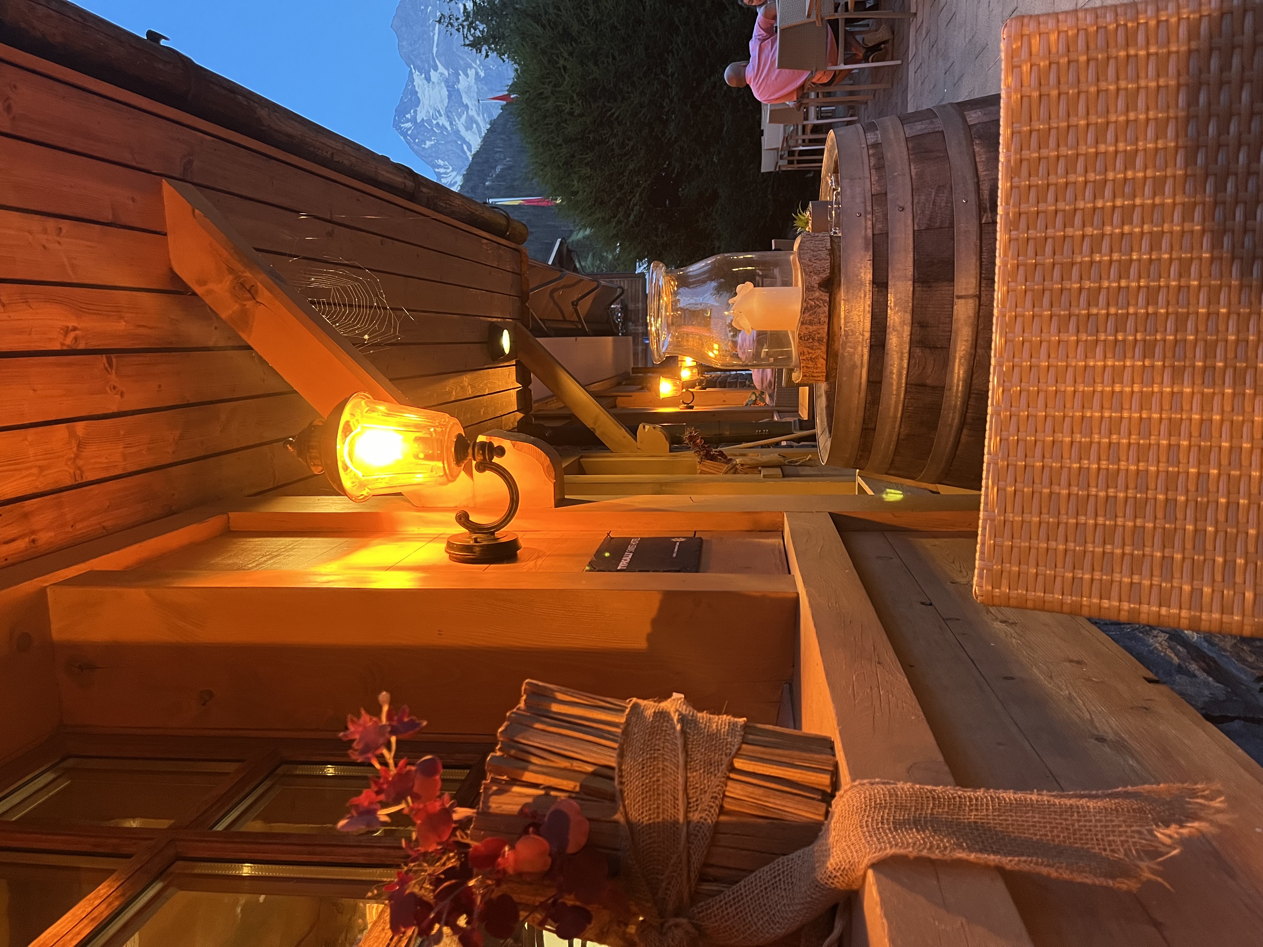 Candlelit restaurant terrace, Kandersteg evening