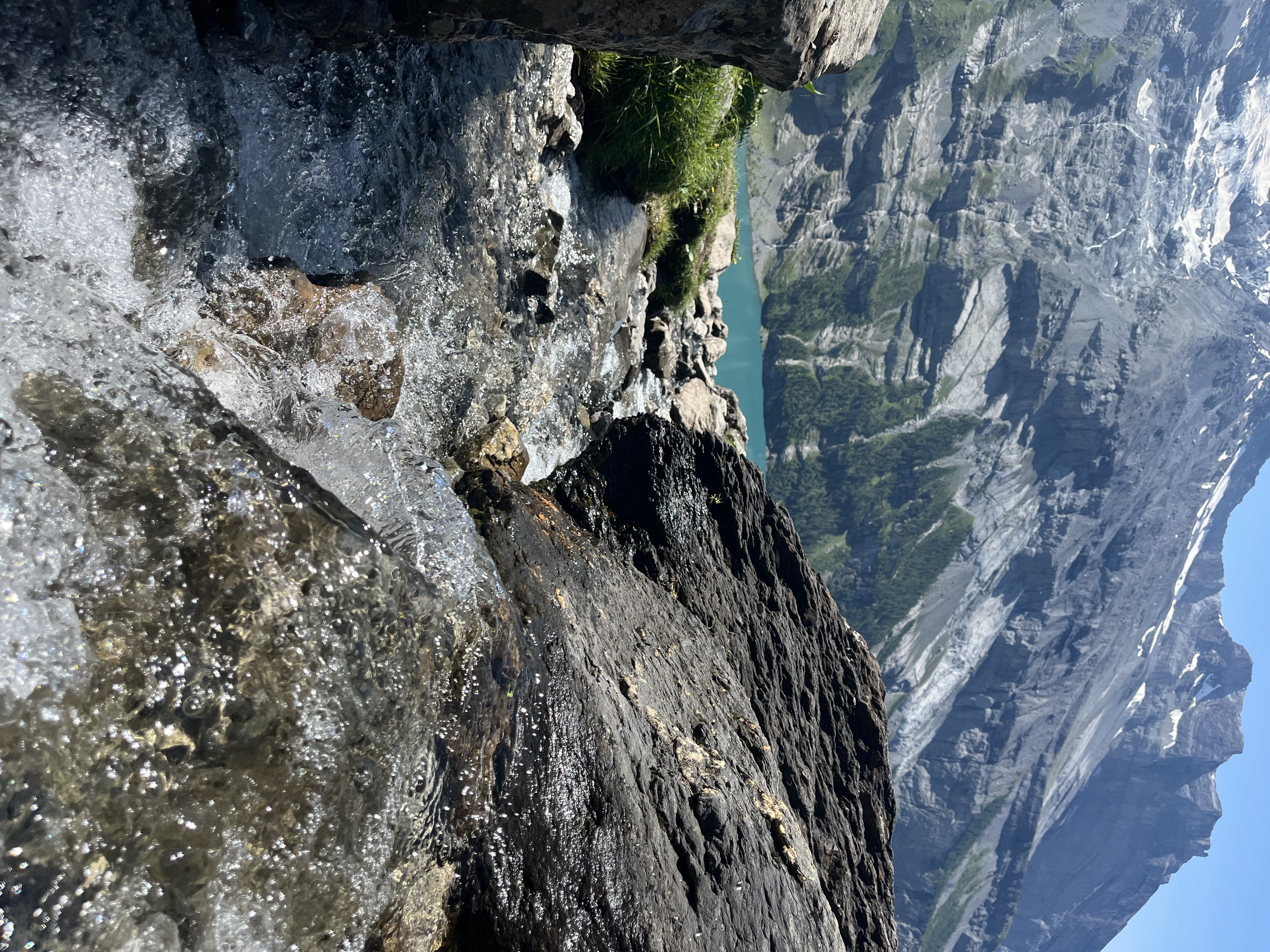 Smooth rock slab with lake and valley below, Oeschinensee