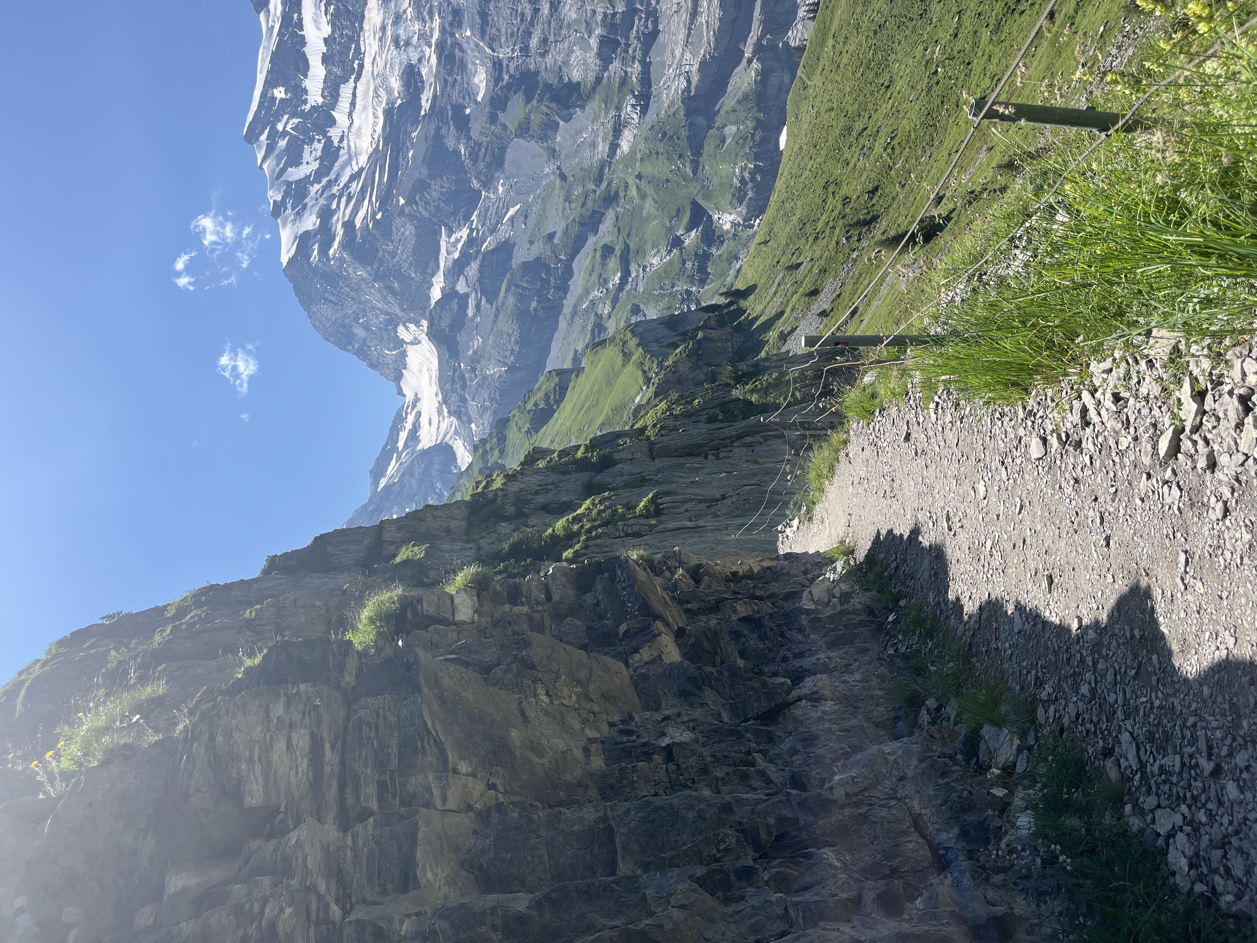 Cliff face and turquoise lake, Oeschinensee